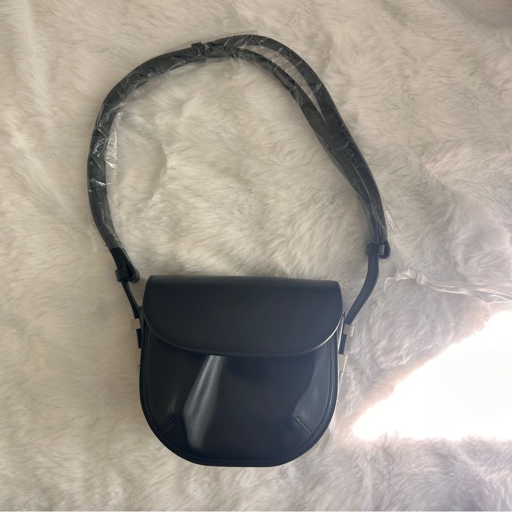 Osoi Cubby Bag - brand new real leather 
Come with dust bag.